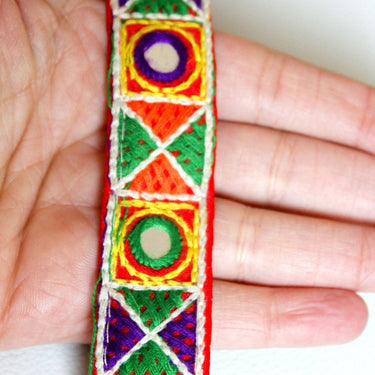 Red Mirrored Fabric Trim With Yellow, Green, Violet